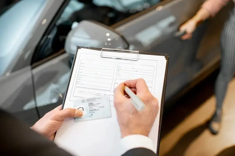Customer reading printed cancellation policy for private chauffeur service in Dubai. 
