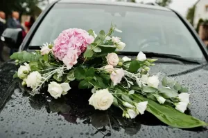 Luxury wedding limousine in Dubai decorated with flowers for bridal booking